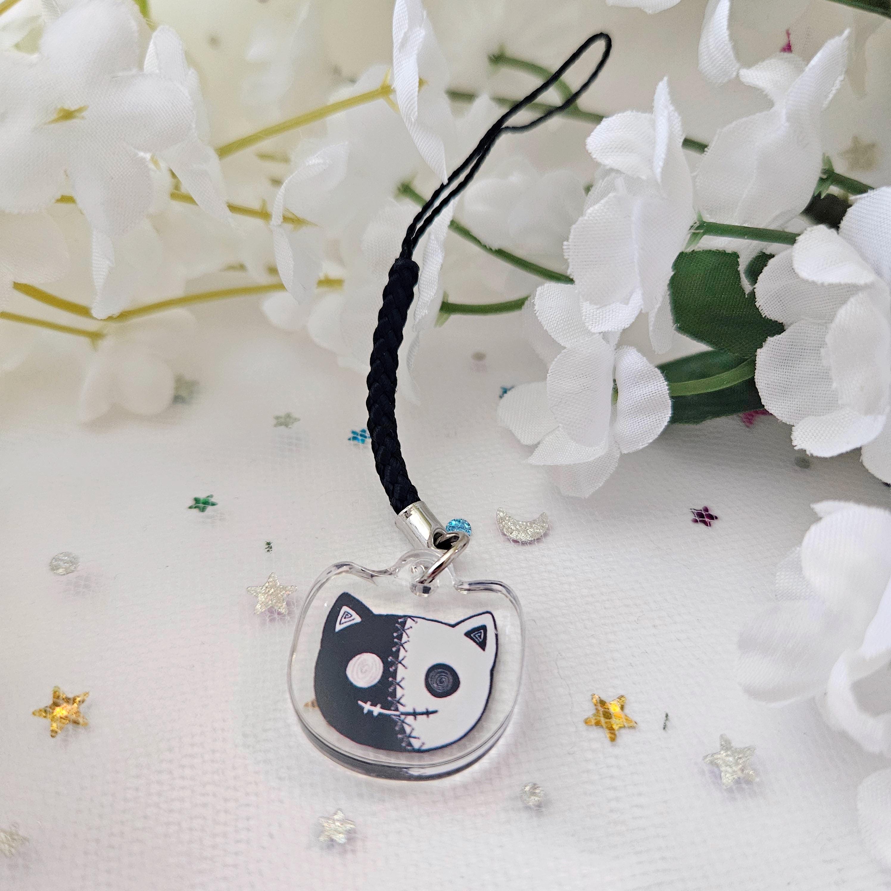 Two Faced Rag Cat Phone Strap